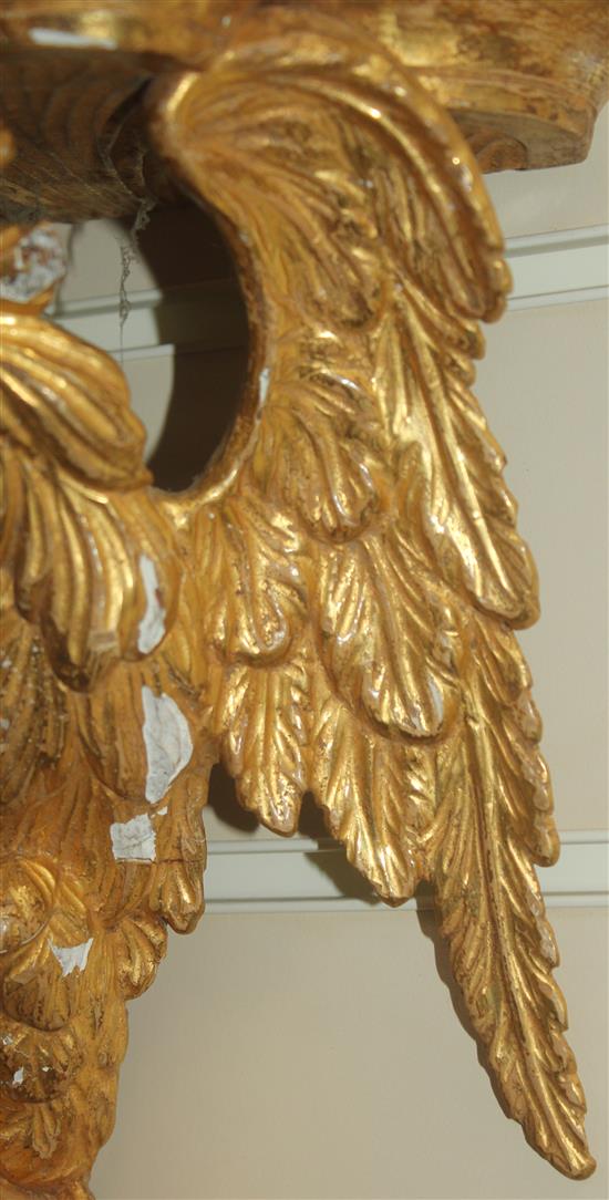 A pair of 19th century carved giltwood wall brackets, 17in.